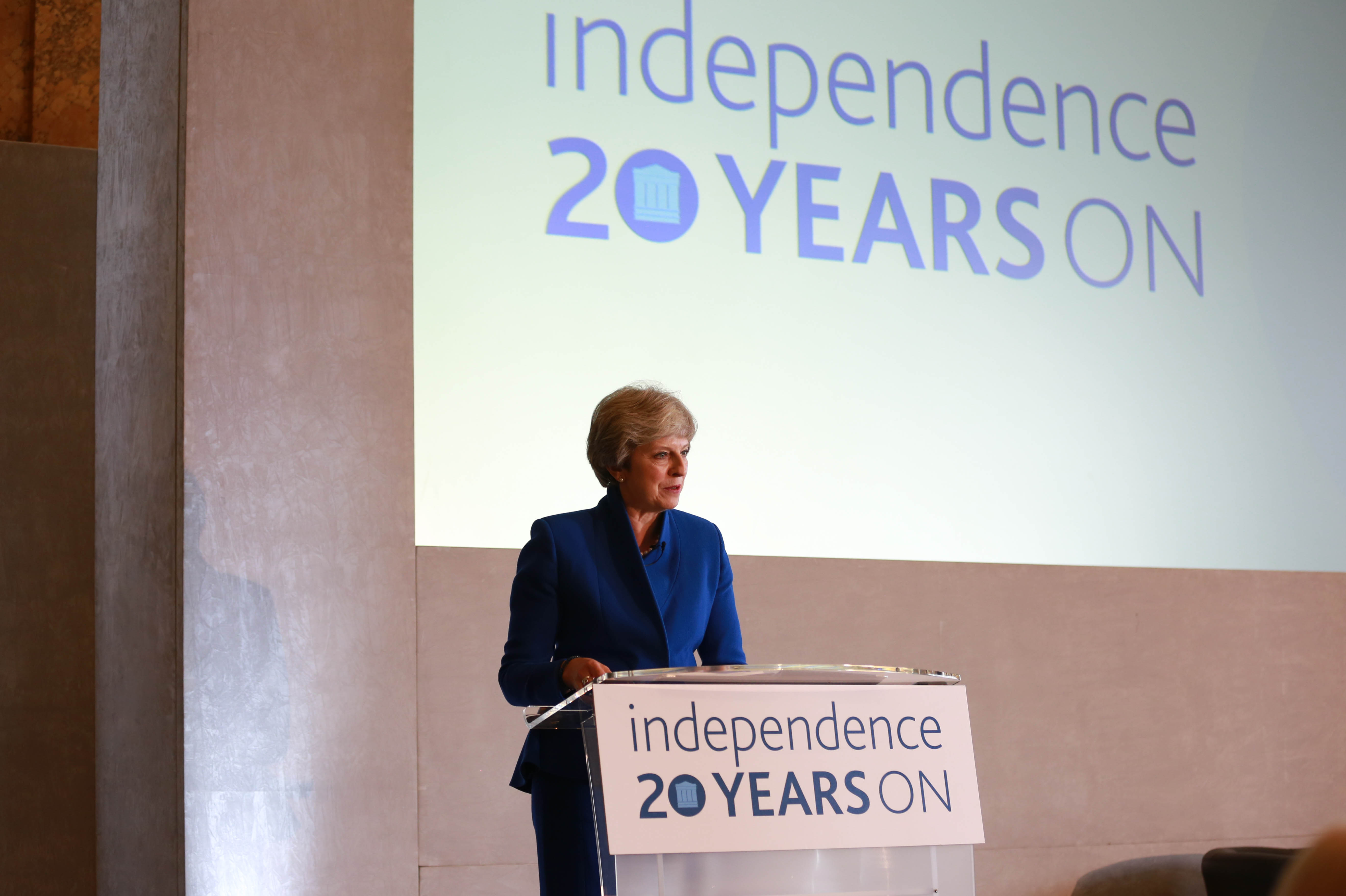 Theresa May presenting