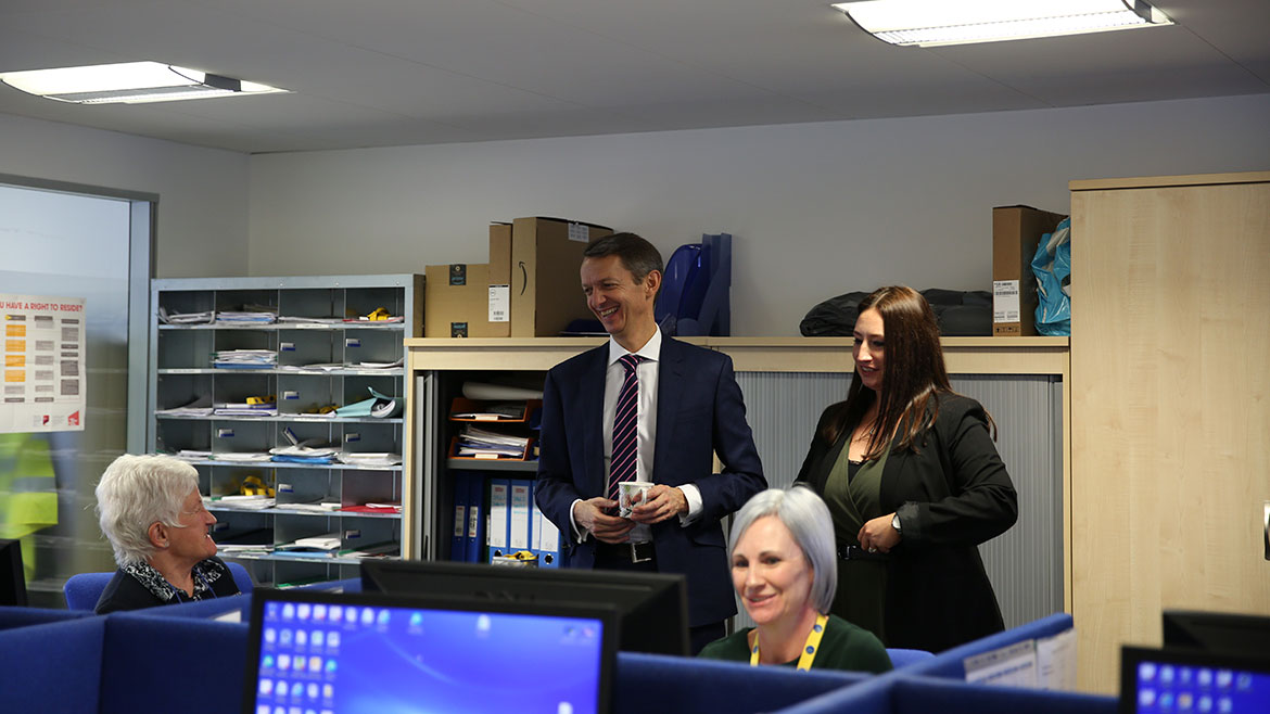 Andy Haldane talking to staff at Citizens Advice Bureau (CAB) in Livingston