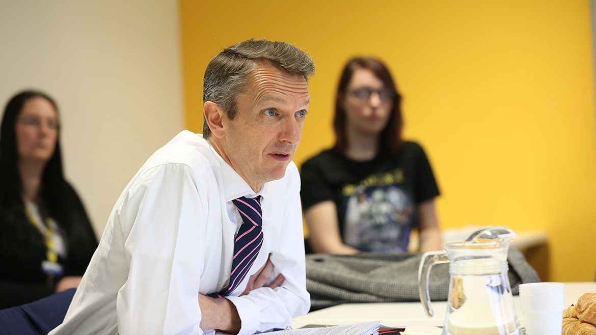 Andy Haldane speaking at a meeting
