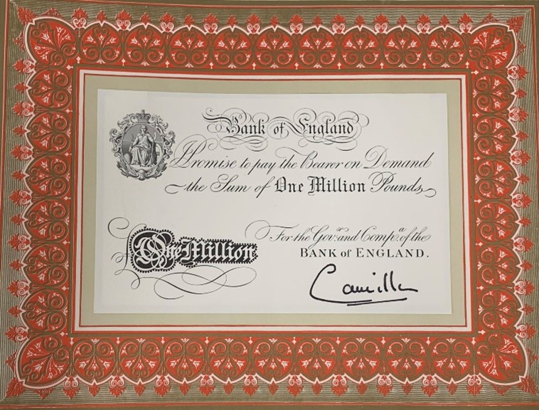 A black and white banknote pasted onto a page of a book, with an elaborate border around it. The signature on the banknote reads ‘Camilla’. 